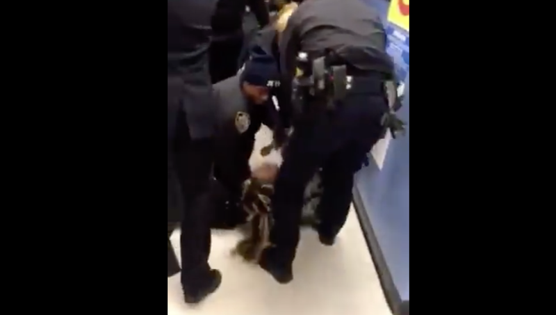 Illustration for article titled NYPD Looks Into Shocking Video of Officers Wrestling a 1-Year-Old From His Mother’s Arms